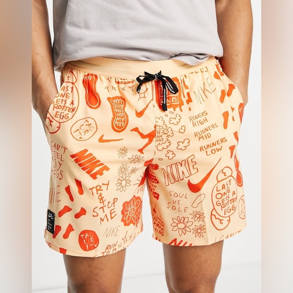 Nike Running Dri-FIT A.I.R. Nathan Bell graphic woven shorts in dusty orange